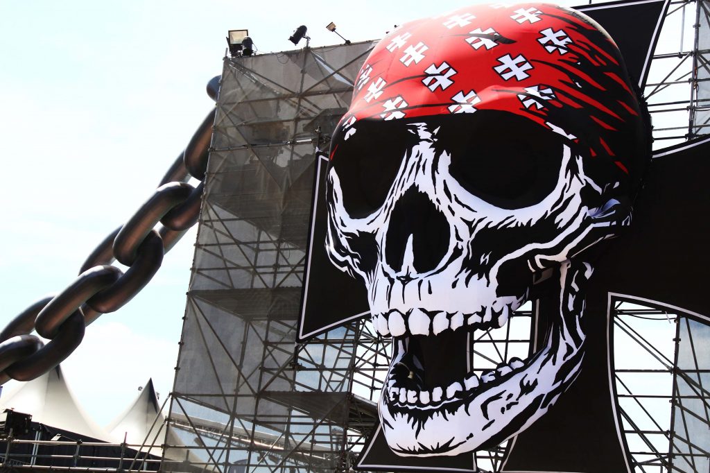 Giant inflatable skull and chain at the entrance of Hellfest