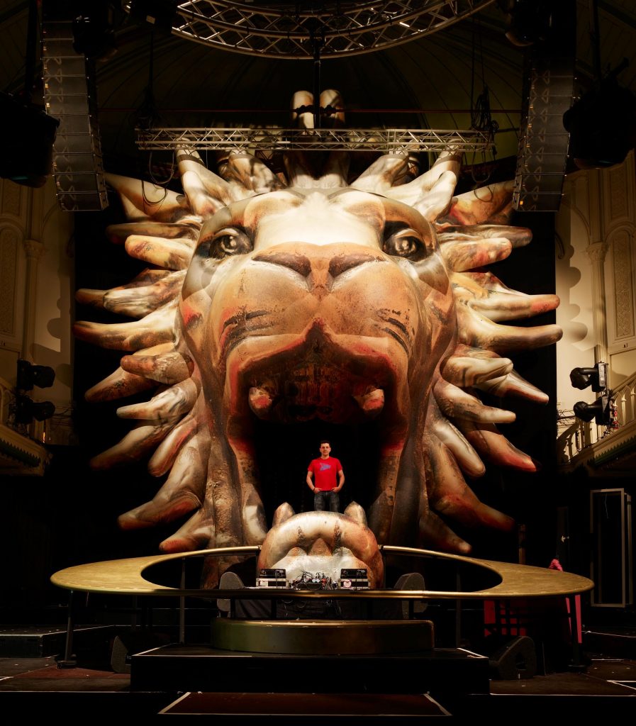 Giant inflatable Lion Head and jaw on stage at Paradiso Amsterdam